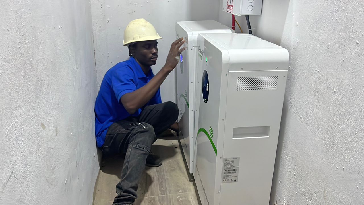 Olak Technologies engineer working on battery storage system