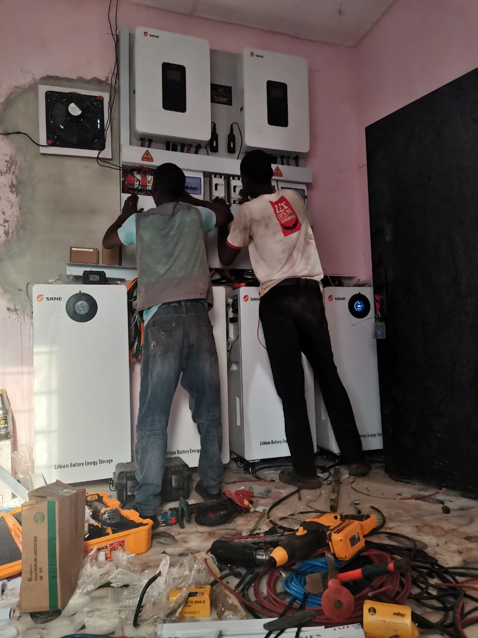 Technicians working during solar energy system installation